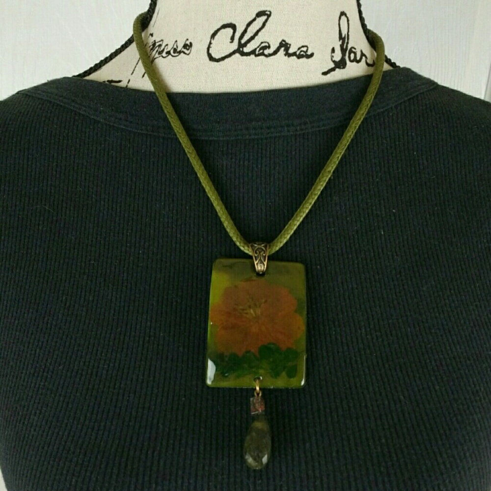 Chico's painted glass flower pendant on green cord